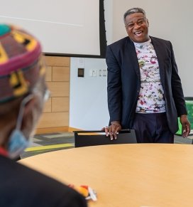 Chief Diversity Officer Cornelius Gilbert reacts to a conversation with Roy V. Hill at the 2024 Juneteenth event on campus