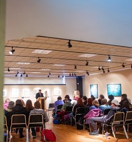 Visual Arts Gallery set up for an artists talk with an audience