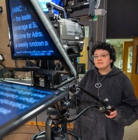 A broadcasting student works in SUNY Adirondack's state-of-the-art video production studio