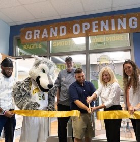 College leaders cut the ribbon to open the new Eddy's Eats in Scoville Learning Center