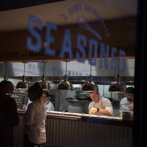 Chef Matt Bolton is seen preparing food at Seasoned restaurant