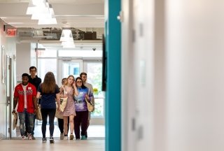 Incoming students tour Adirondack Hall on Accepted Student Day