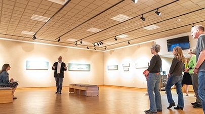 The artist, Alberto Ray, giving a gallery talk in the Visual Arts Gallery