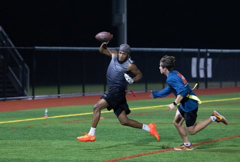 Elijah Cullum evades "tackle" in an intramural flag football game