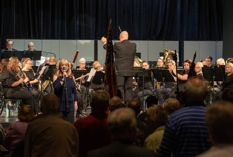 Image of a band concert in the Theatre with an audience 